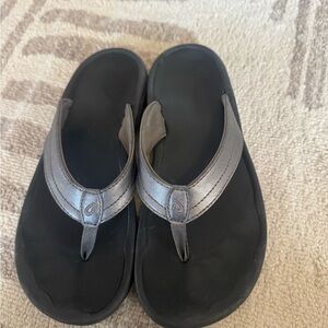 OluKai Obana Black and Metallic Gray Sandal